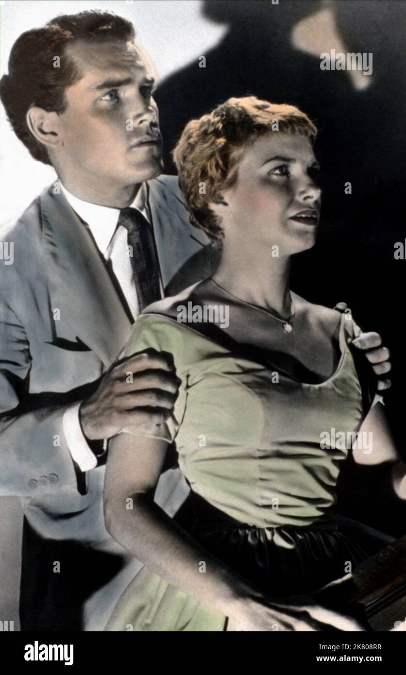 Jeffrey Hunter & Joanne Woodward Film: A Kiss Before Dying (USA 1956) Characters: Gordon Grant,Dorothy ('Dorie') Kingship  / Literaturverfilmung (Based On The Book By Ira Levin) Director: Gerd Oswald 20 April 1956   **WARNING** This Photograph is for editorial use only and is the copyright of CROWN PRODUCTIONS and/or the Photographer assigned by the Film or Production Company and can only be reproduced by publications in conjunction with the promotion of the above Film. A Mandatory Credit To CROWN PRODUCTIONS is required. The Photographer should also be credited when known. No commercial use c Stock Photo