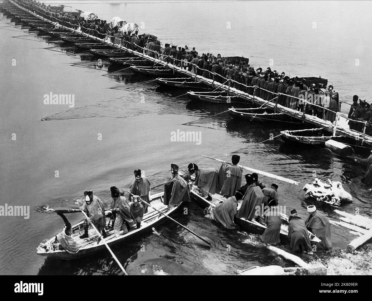 Crossing Of The Beresina River Film: War And Peace (USA/IT 1956)   Director: King Vidor 21 August 1956   **WARNING** This Photograph is for editorial use only and is the copyright of PARAMOUNT and/or the Photographer assigned by the Film or Production Company and can only be reproduced by publications in conjunction with the promotion of the above Film. A Mandatory Credit To PARAMOUNT is required. The Photographer should also be credited when known. No commercial use can be granted without written authority from the Film Company. Stock Photo