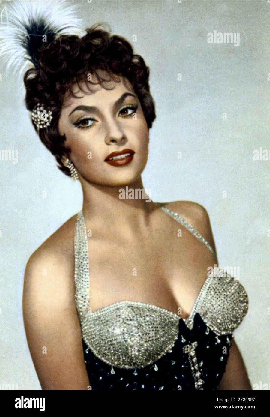 Gina Lollobrigida Film: Trapeze (USA 1956) Characters: Lola  Director: Carol Reed 30 May 1956   **WARNING** This Photograph is for editorial use only and is the copyright of UNITED ARTISTS and/or the Photographer assigned by the Film or Production Company and can only be reproduced by publications in conjunction with the promotion of the above Film. A Mandatory Credit To UNITED ARTISTS is required. The Photographer should also be credited when known. No commercial use can be granted without written authority from the Film Company. Stock Photo
