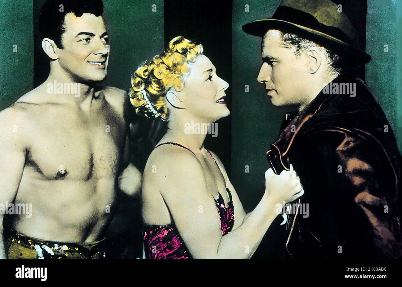 Cornel Wilde, Betty Hutton & Charlton Heston Film: The Greatest Show On Earth (1950) Characters: The Great Sebastian,Holly & Brad Braden  Director: Cecil B. Demille 10 January 1952   **WARNING** This Photograph is for editorial use only and is the copyright of PARAMOUNT PICTURES and/or the Photographer assigned by the Film or Production Company and can only be reproduced by publications in conjunction with the promotion of the above Film. A Mandatory Credit To PARAMOUNT PICTURES is required. The Photographer should also be credited when known. No commercial use can be granted without written a Stock Photo