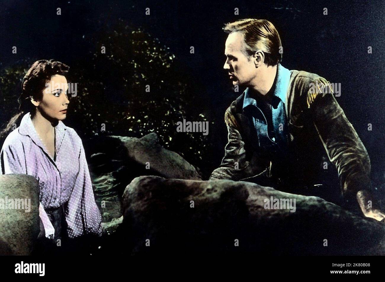 Felicia Farr & Richard Widmark Film: The Last Wagon (1956) Characters: Jenny & Comanche Todd  Director: Delmer Daves 21 September 1956   **WARNING** This Photograph is for editorial use only and is the copyright of 20TH and/or the Photographer assigned by the Film or Production Company and can only be reproduced by publications in conjunction with the promotion of the above Film. A Mandatory Credit To 20TH is required. The Photographer should also be credited when known. No commercial use can be granted without written authority from the Film Company. Stock Photo