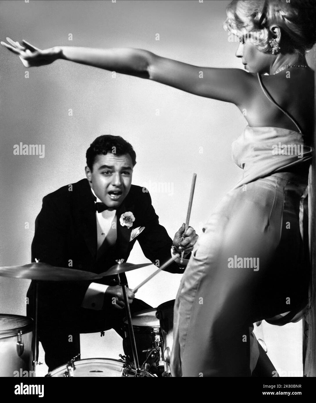 Sal Mineo  Film The Gene Krupa Story (1954) Characters: Gene Krupa  01 December 1959   **WARNING** This Photograph is for editorial use only and is the copyright of The  Film Company and/or the Photographer assigned by the  Film or Production Company and can only be reproduced by publications in conjunction with the promotion of the above  Film. A Mandatory Credit To The  Film Company is required. The Photographer should also be credited when known. No commercial use can be granted without written authority from the  Film Company. Stock Photo