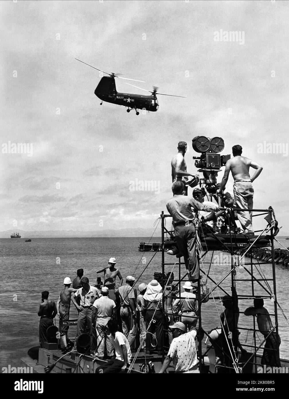 Helicopter Scene Film: Away All Boats (USA 1956)   Director: Joseph Pevney 16 August 1956   **WARNING** This Photograph is for editorial use only and is the copyright of UNIVERSAL and/or the Photographer assigned by the Film or Production Company and can only be reproduced by publications in conjunction with the promotion of the above Film. A Mandatory Credit To UNIVERSAL is required. The Photographer should also be credited when known. No commercial use can be granted without written authority from the Film Company. Stock Photo