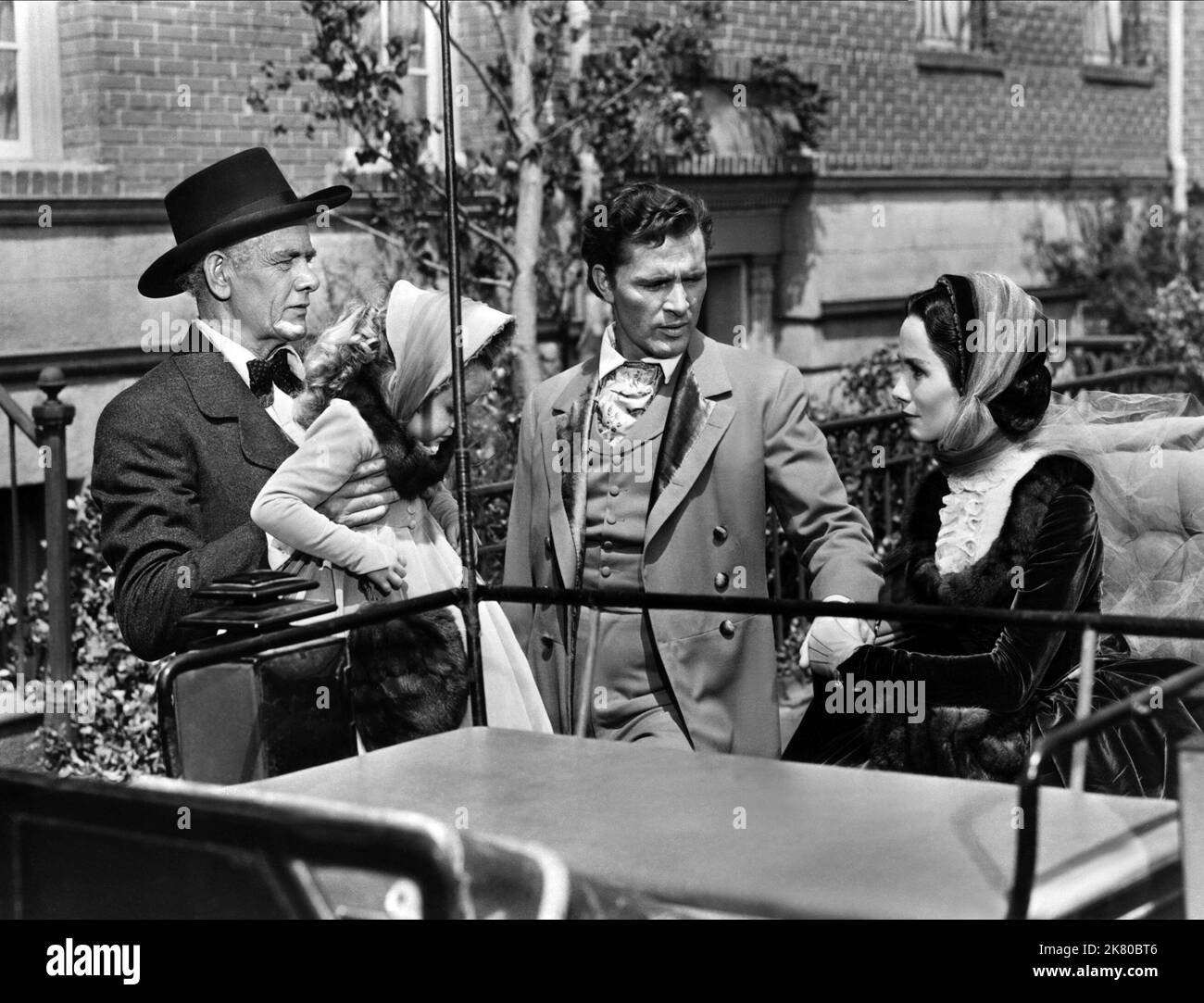 Charles Bickford, Richard Burton & Maggie Mcnamara Film: Prince Of Players (1955) Characters: DAVE PRESCOTT, EDWIN BOOTH, MARY DEVLIN BOOTH  Director: Philip Dunne 11 January 1955   **WARNING** This Photograph is for editorial use only and is the copyright of 20TH CENTURY FOX and/or the Photographer assigned by the Film or Production Company and can only be reproduced by publications in conjunction with the promotion of the above Film. A Mandatory Credit To 20TH CENTURY FOX is required. The Photographer should also be credited when known. No commercial use can be granted without written author Stock Photo