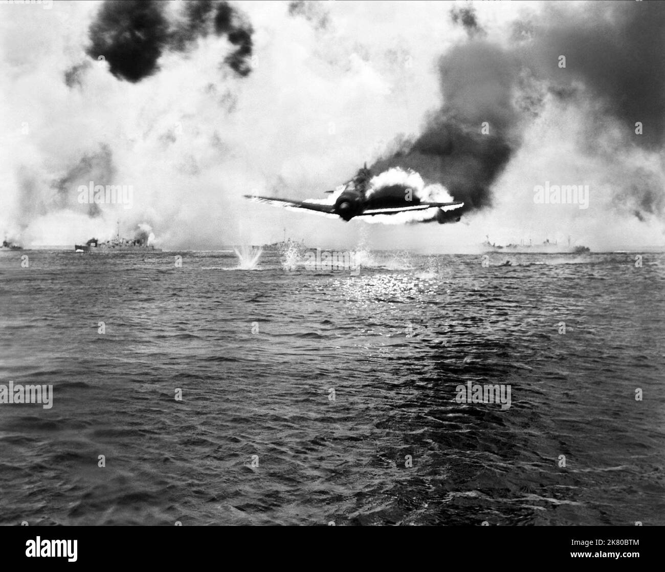 Aeroplane Crash On Fire Film: Away All Boats (USA 1956)   Director: Joseph Pevney 16 August 1956   **WARNING** This Photograph is for editorial use only and is the copyright of UNIVERSAL and/or the Photographer assigned by the Film or Production Company and can only be reproduced by publications in conjunction with the promotion of the above Film. A Mandatory Credit To UNIVERSAL is required. The Photographer should also be credited when known. No commercial use can be granted without written authority from the Film Company. Stock Photo
