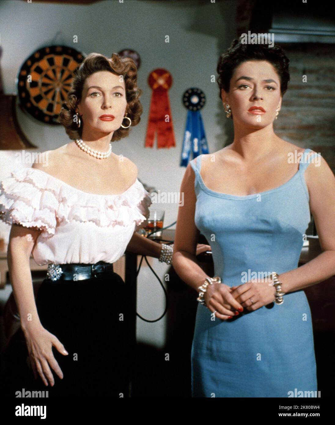 Margaret Hayes & Ruth Roman Film: Beyond The River; The Bottom Of The Bottle (1956) Characters: Lil Breckinridge, Nora Martin  Director: Henry Hathaway 01 February 1956   **WARNING** This Photograph is for editorial use only and is the copyright of 20 CENTURY FOX and/or the Photographer assigned by the Film or Production Company and can only be reproduced by publications in conjunction with the promotion of the above Film. A Mandatory Credit To 20 CENTURY FOX is required. The Photographer should also be credited when known. No commercial use can be granted without written authority from the Fi Stock Photo