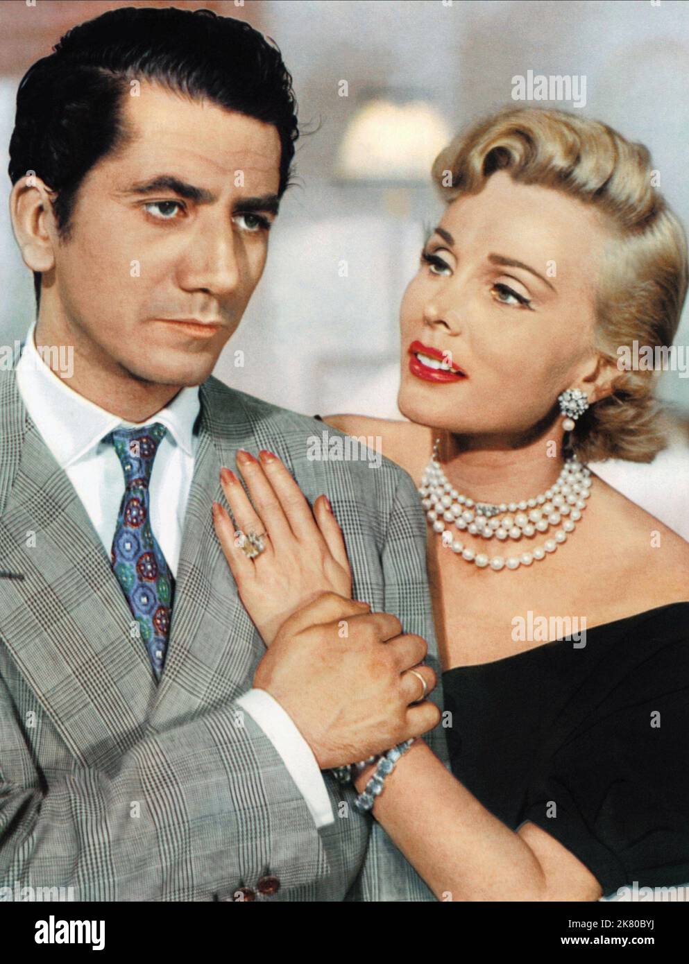 Daniel Gelin & Zsa Zsa Gabor Film: Beauty And The Bullfighter; Love In A Hot Climate (Sang et lumieres) Characters: Ricardo Garcia, Marilena  Fr/E 1954, Regie: Georges Rouquier, Ricardo Munez Suay, Director: Ricardo Munoz Suay, G Rouquier 01 May 1953   **WARNING** This Photograph is for editorial use only and is the copyright of ARCADIA FILMS and/or the Photographer assigned by the Film or Production Company and can only be reproduced by publications in conjunction with the promotion of the above Film. A Mandatory Credit To ARCADIA FILMS is required. The Photographer should also be credited wh Stock Photo