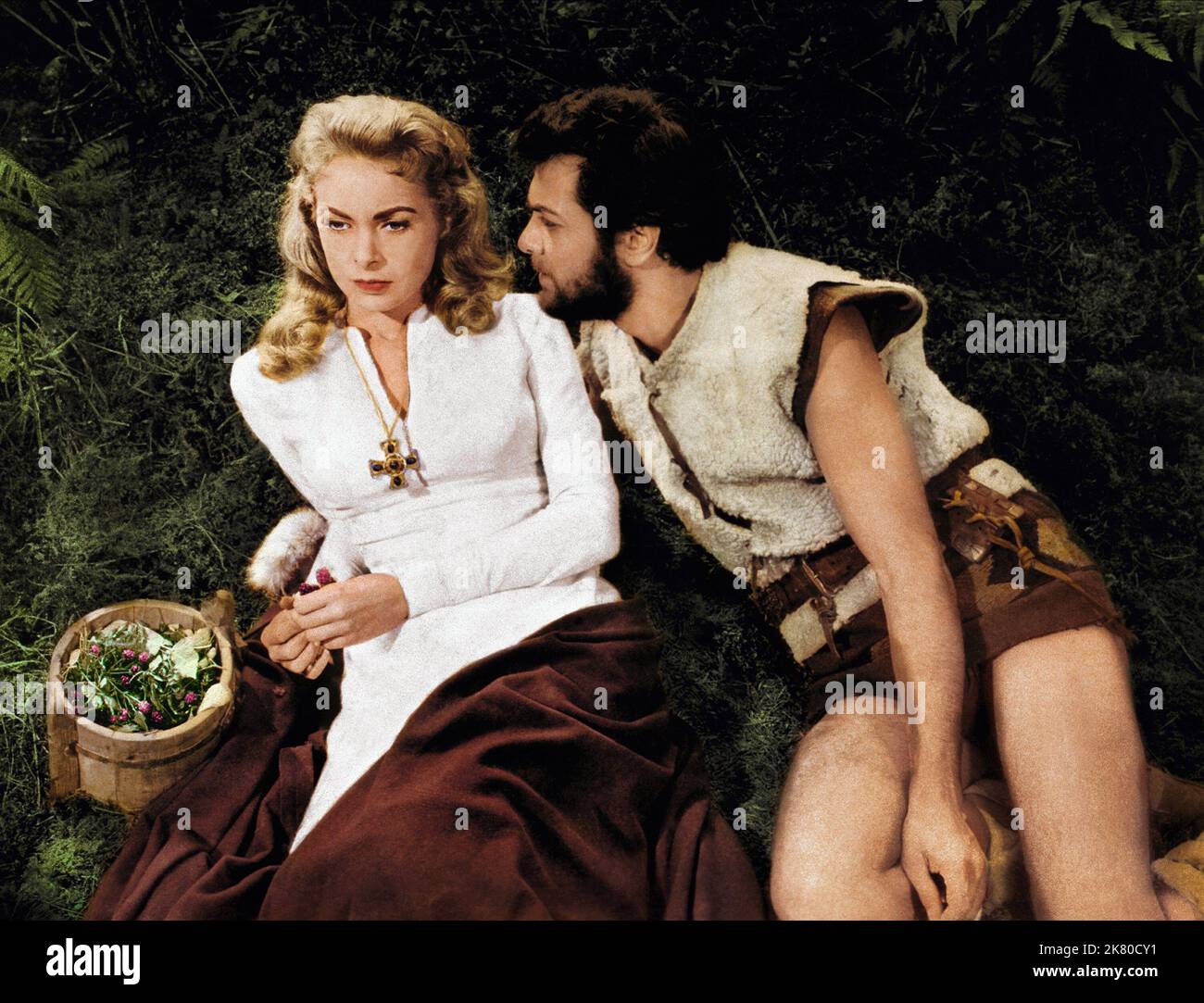 Janet Leigh & Tony Curtis Film: The Vikings (USA 1958) Characters: Morgana, Eric  Director: Richard Fleischer 11 June 1958   **WARNING** This Photograph is for editorial use only and is the copyright of UNITED ARTISTS and/or the Photographer assigned by the Film or Production Company and can only be reproduced by publications in conjunction with the promotion of the above Film. A Mandatory Credit To UNITED ARTISTS is required. The Photographer should also be credited when known. No commercial use can be granted without written authority from the Film Company. Stock Photo