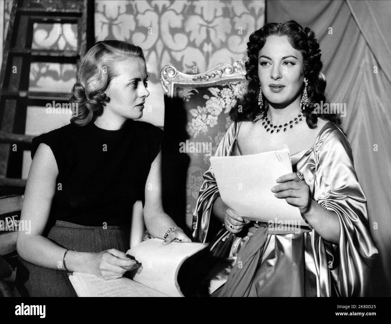 Jean Wallace & Yvonne Sanson Film: Star Of India (1954) Characters: Katrina, Mme. de Montespan  Director: Arthur Lubin 01 February 1954   **WARNING** This Photograph is for editorial use only and is the copyright of UNITED ARTISTS and/or the Photographer assigned by the Film or Production Company and can only be reproduced by publications in conjunction with the promotion of the above Film. A Mandatory Credit To UNITED ARTISTS is required. The Photographer should also be credited when known. No commercial use can be granted without written authority from the Film Company. Stock Photo