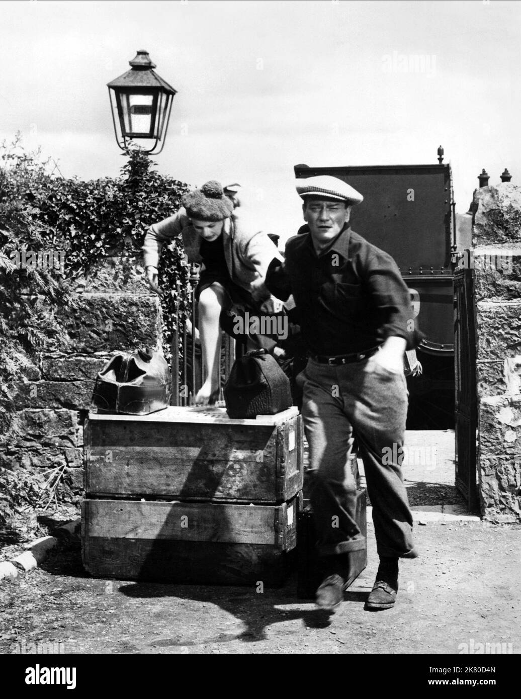 Maureen O'Hara & John Wayne  Film The Quiet Man (USA 1952) Characters: Mary Kate Danaher, Sean Thornton  Director: John Farrow 06 June 1952   **WARNING** This Photograph is for editorial use only and is the copyright of REPUBLIC PICTURES and/or the Photographer assigned by the  Film or Production Company and can only be reproduced by publications in conjunction with the promotion of the above  Film. A Mandatory Credit To REPUBLIC PICTURES is required. The Photographer should also be credited when known. No commercial use can be granted without written authority from the  Film Company. Stock Photo