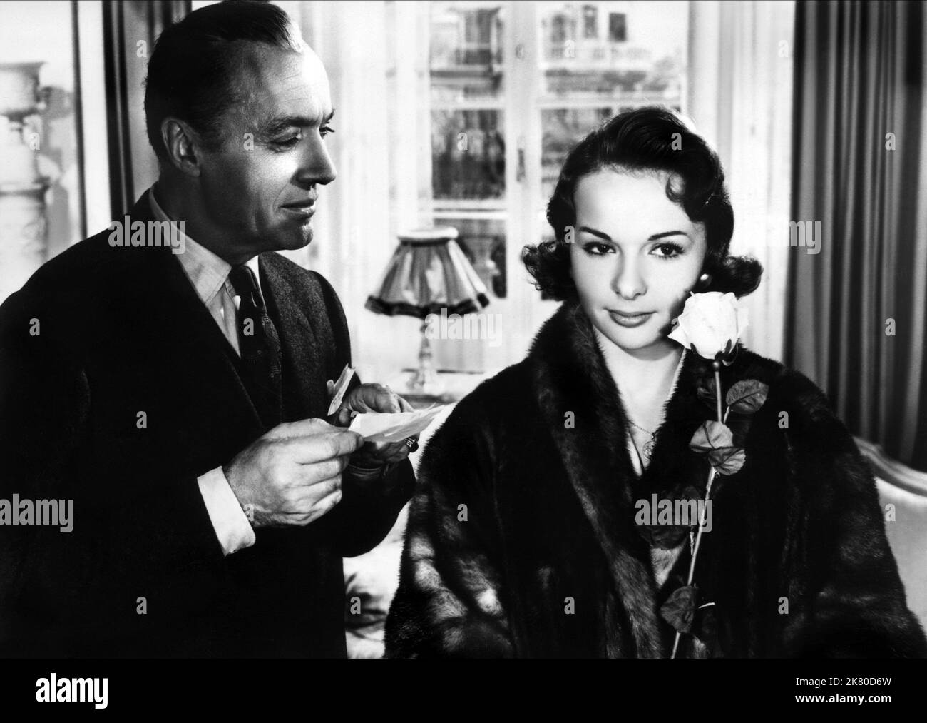 Charles Boyer & Francoise Arnoul Film: Paris, Palace Hotel (1959) Characters: Henri Delormel, Francoise Noblet  Director: Henri Verneuil 19 October 1956   **WARNING** This Photograph is for editorial use only and is the copyright of FILMS AROUND THE WORLD and/or the Photographer assigned by the Film or Production Company and can only be reproduced by publications in conjunction with the promotion of the above Film. A Mandatory Credit To FILMS AROUND THE WORLD is required. The Photographer should also be credited when known. No commercial use can be granted without written authority from the Fi Stock Photo