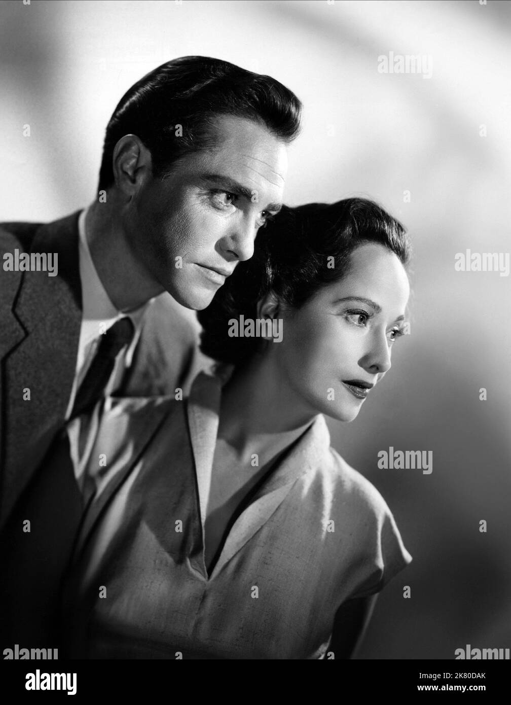 Richard Todd & Merle Oberon  Film 24 Hours Of A Woman'S Life (1951) Characters: The Young Man, Linda Venning  Director: Victor Saville 11 September 1952   **WARNING** This Photograph is for editorial use only and is the copyright of ABPC and/or the Photographer assigned by the  Film or Production Company and can only be reproduced by publications in conjunction with the promotion of the above  Film. A Mandatory Credit To ABPC is required. The Photographer should also be credited when known. No commercial use can be granted without written authority from the  Film Company. Stock Photo