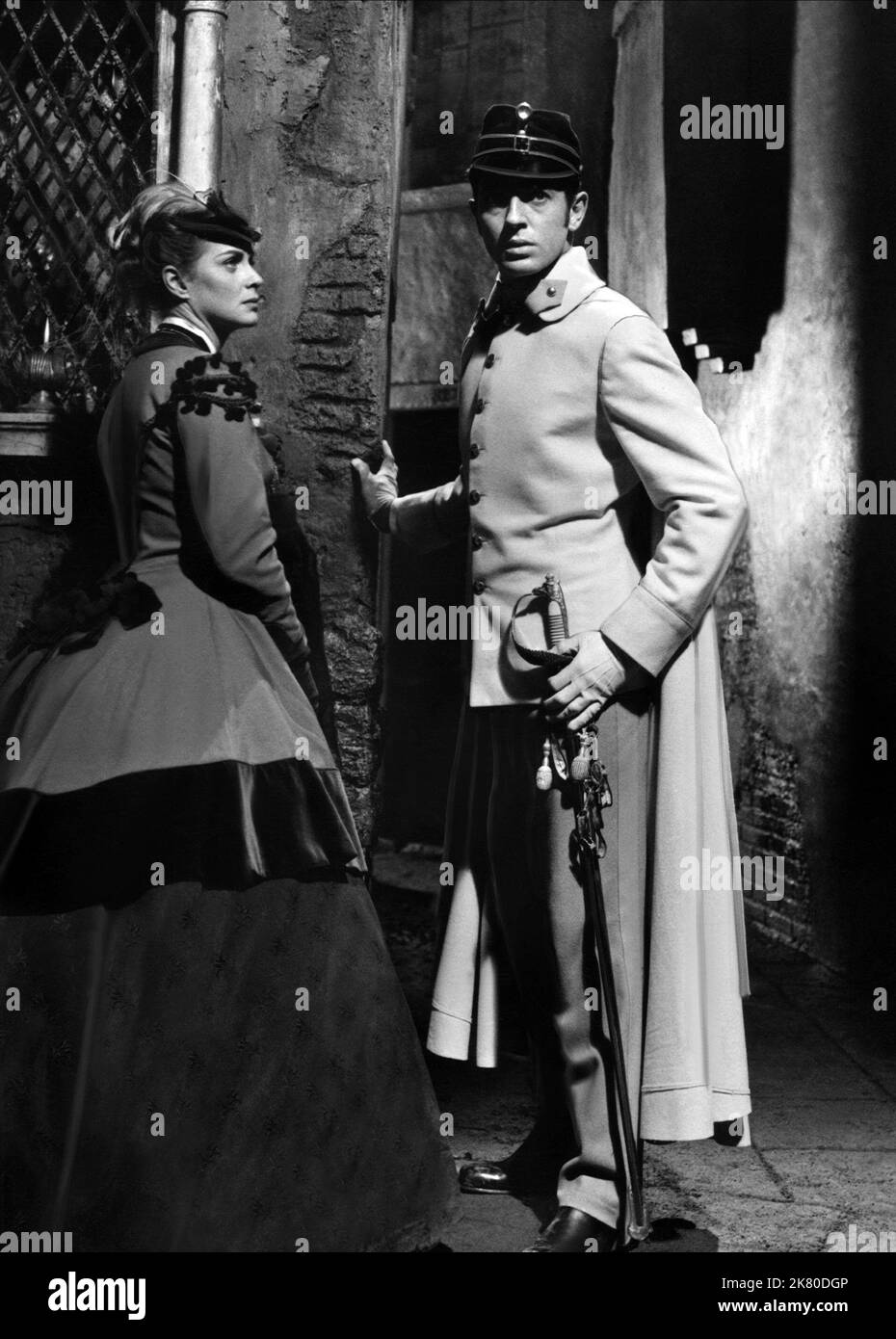 Alida Valli & Farley Granger Film: Senso (1955) Characters: La contessa Livia Serpieri, Il tenente Franz Mahler  Director: Luchino Visconti 03 September 1954   **WARNING** This Photograph is for editorial use only and is the copyright of LUX FILM and/or the Photographer assigned by the Film or Production Company and can only be reproduced by publications in conjunction with the promotion of the above Film. A Mandatory Credit To LUX FILM is required. The Photographer should also be credited when known. No commercial use can be granted without written authority from the Film Company. Stock Photo