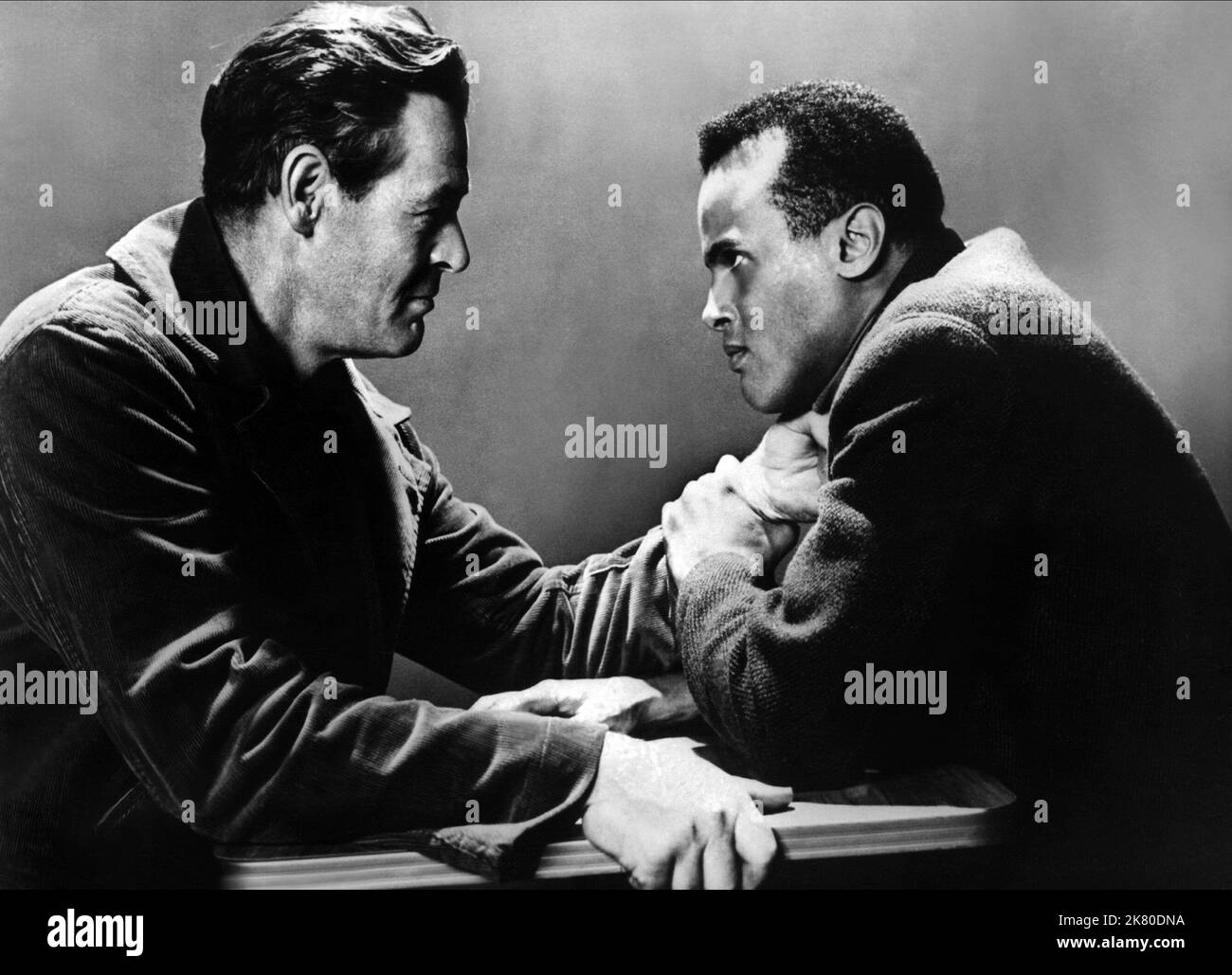 Robert Ryan & Harry Belafonte Film: Odds Against Tomorrow (1959) Characters: Earle Slater, Johnny Ingram  Director: Robert Wise 15 October 1959   **WARNING** This Photograph is for editorial use only and is the copyright of UNITED ARTISTS and/or the Photographer assigned by the Film or Production Company and can only be reproduced by publications in conjunction with the promotion of the above Film. A Mandatory Credit To UNITED ARTISTS is required. The Photographer should also be credited when known. No commercial use can be granted without written authority from the Film Company. Stock Photo