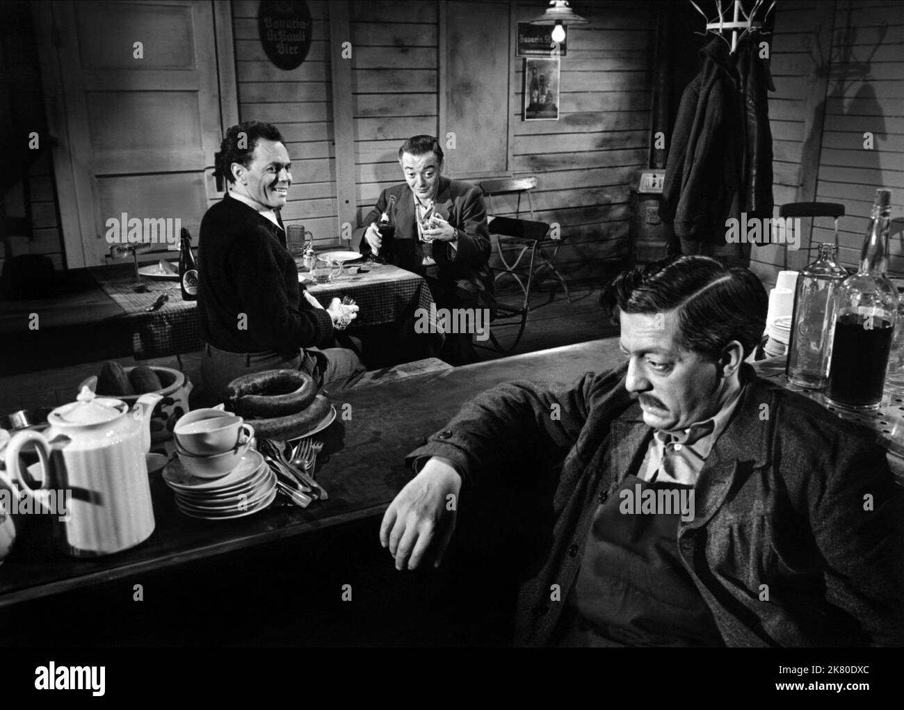 Karl John, Peter Lorre & Johanna Hofer Film: Der Verlorene (DEU 1951) Characters: Hosch, alias Nowak, Dr. Karl Rothe, alias Dr. Karl Neumeister, Frau Hermann  Director: Peter Lorre 07 September 1951   **WARNING** This Photograph is for editorial use only and is the copyright of ARNOLD PRESSBURGER FILMPROD. and/or the Photographer assigned by the Film or Production Company and can only be reproduced by publications in conjunction with the promotion of the above Film. A Mandatory Credit To ARNOLD PRESSBURGER FILMPROD. is required. The Photographer should also be credited when known. No commercia Stock Photo