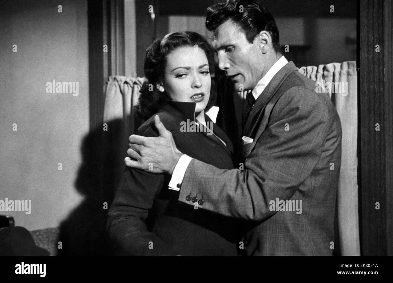 Linda Darnell & Jack Palance Film: Second Chance (1953) Characters: Clare Shepperd, alias Clare Sinclair, Cappy Gordon  Director: Rudolph Mate 18 July 1953   **WARNING** This Photograph is for editorial use only and is the copyright of RKO and/or the Photographer assigned by the Film or Production Company and can only be reproduced by publications in conjunction with the promotion of the above Film. A Mandatory Credit To RKO is required. The Photographer should also be credited when known. No commercial use can be granted without written authority from the Film Company. Stock Photo