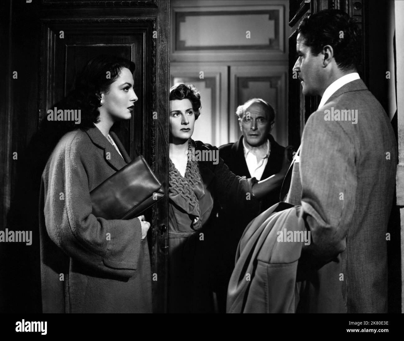 Yvonne Sanson, Tina Lattanzi & Amedeo Nazzari Film: Tormento (1950) Characters: Anna Ferrari, Matilde Ferrari, Carlo Guarnieri  Director: Raffaello Matarazzo 11 February 1950   **WARNING** This Photograph is for editorial use only and is the copyright of TITABUS and/or the Photographer assigned by the Film or Production Company and can only be reproduced by publications in conjunction with the promotion of the above Film. A Mandatory Credit To TITABUS is required. The Photographer should also be credited when known. No commercial use can be granted without written authority from the Film Compa Stock Photo