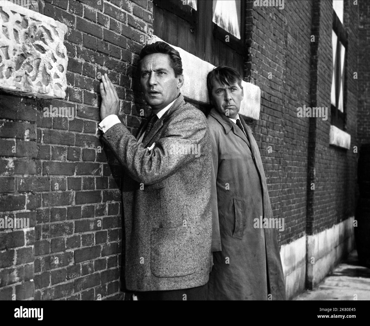 Peter Finch & Alexander Knox Film: Operation Amsterdam (UK 1959) Characters: Jan Smit, Walter Keyser  Director: Michael Mccarthy 12 January 1959   **WARNING** This Photograph is for editorial use only and is the copyright of THE RANK ORGANISATION and/or the Photographer assigned by the Film or Production Company and can only be reproduced by publications in conjunction with the promotion of the above Film. A Mandatory Credit To THE RANK ORGANISATION is required. The Photographer should also be credited when known. No commercial use can be granted without written authority from the Film Company Stock Photo