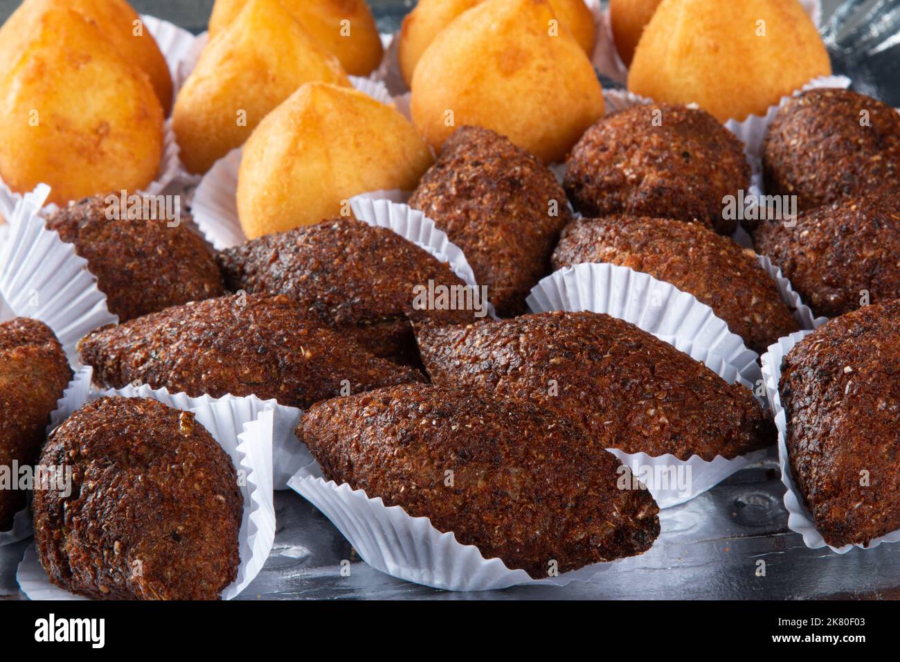 Roasted kibe e Coxinha. Traditional Brazilian snack. Stock Photo