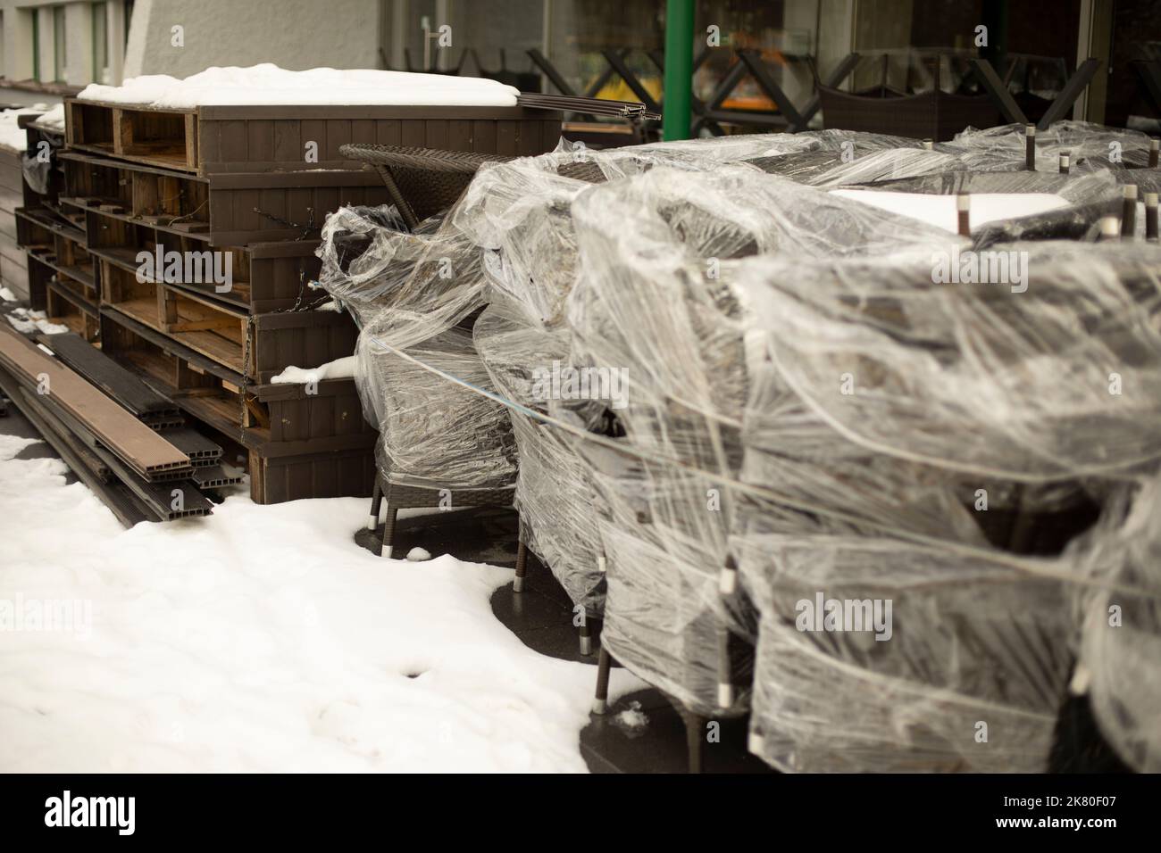 Chairs in film. Preparation for transportation of furniture. Warehouse