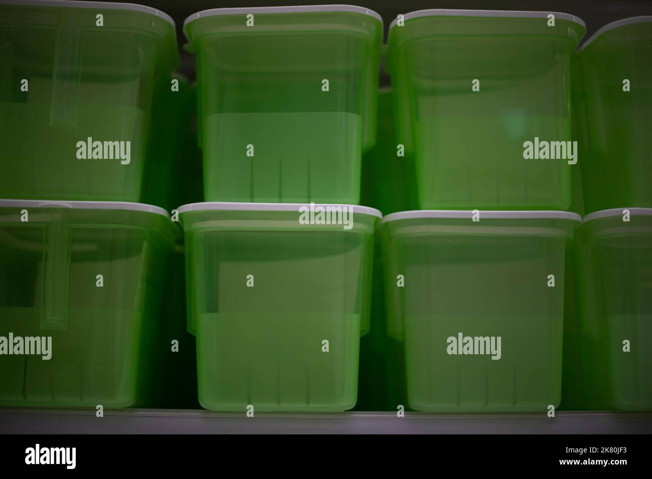 Food containers in store. Plastic boxes. Food storage tanks. Plastic