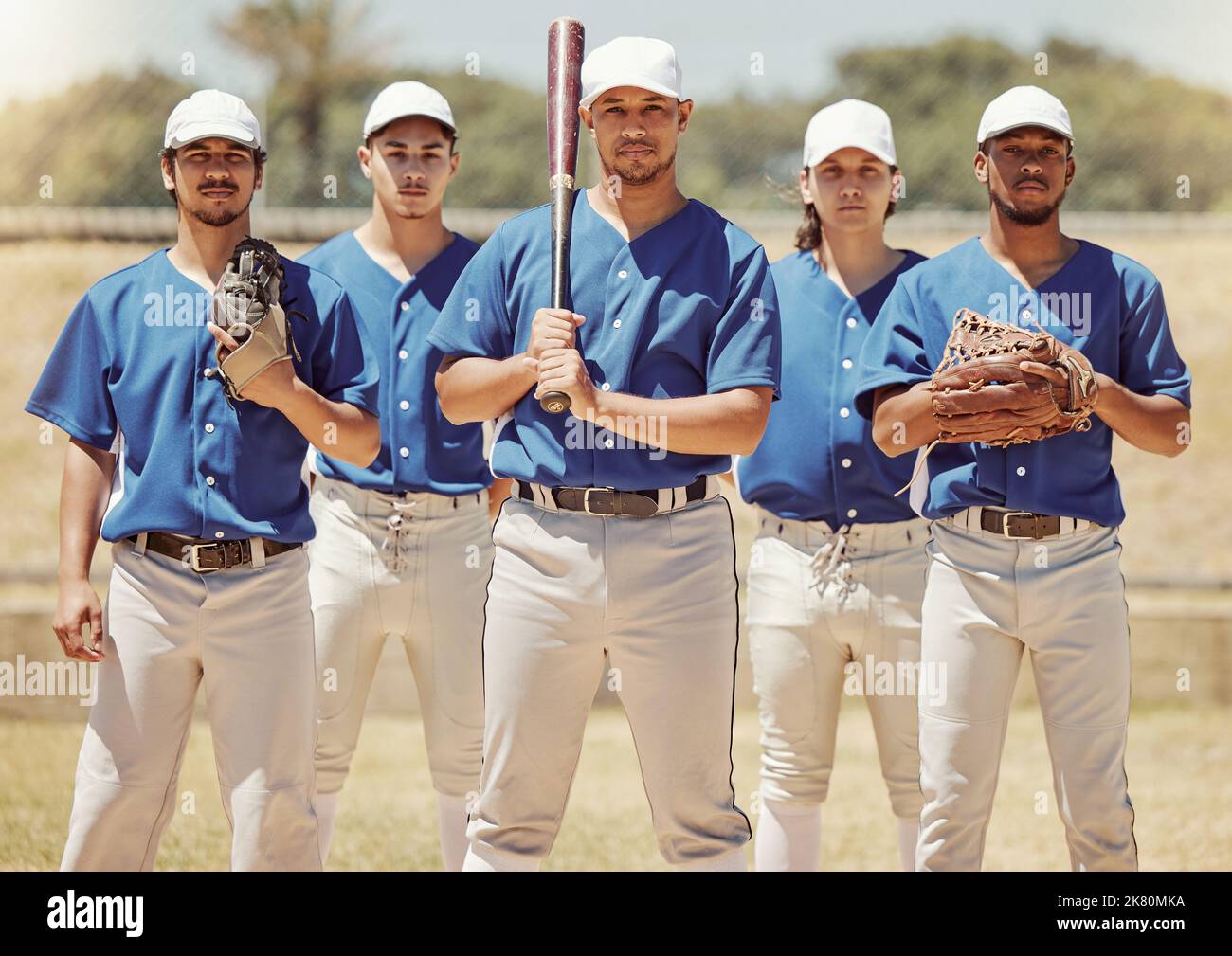 Sports, team and baseball portrait by sport people standing in power, support and fitness training on baseball field. Softball, diversity and Stock Photo