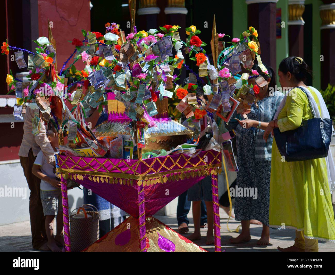 Buddhist devotees conducting different rituals during Kothin Chibor Dan ...