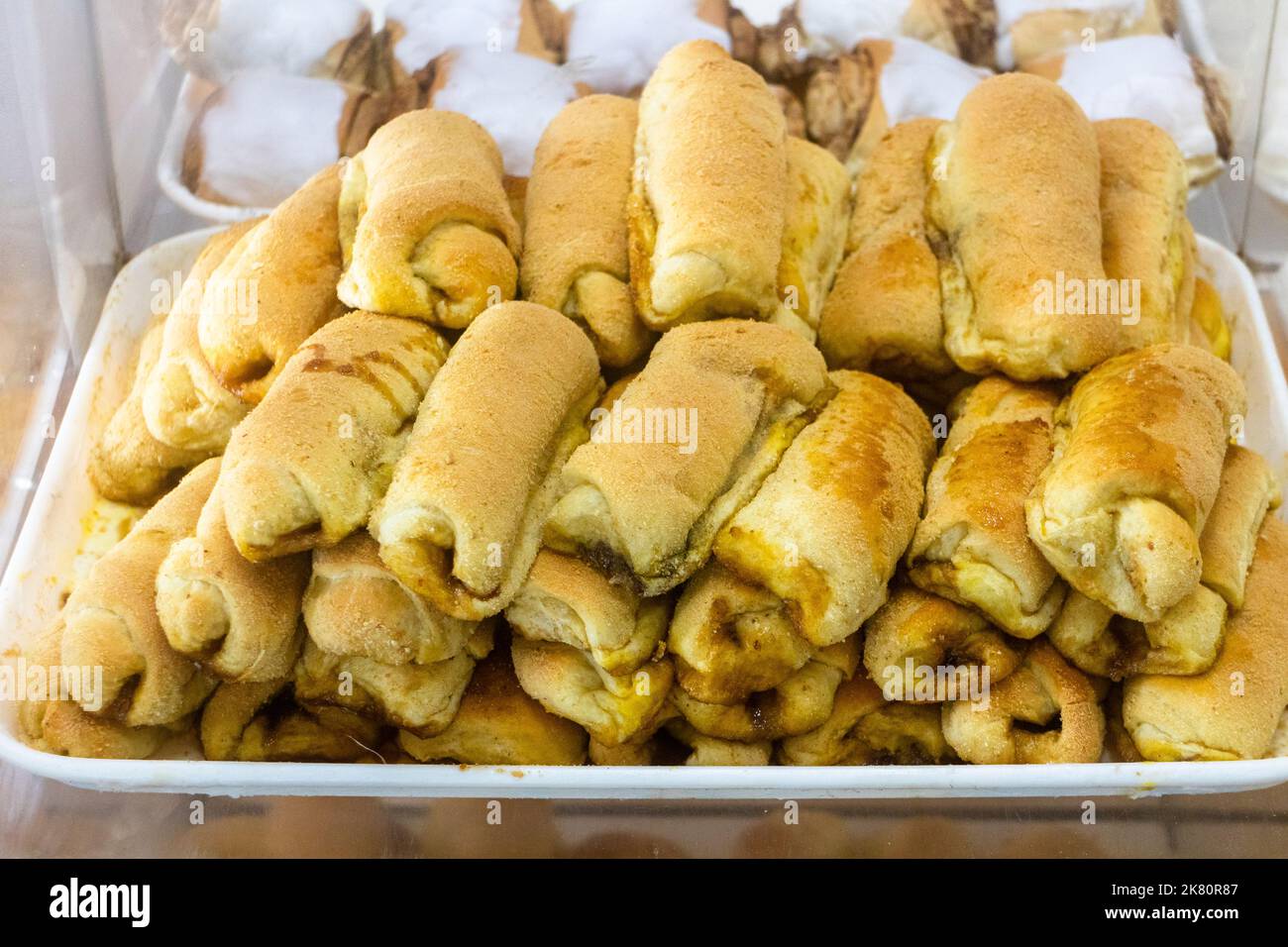 A tray of local Filipino bread called spanish bread in popular in Cebu