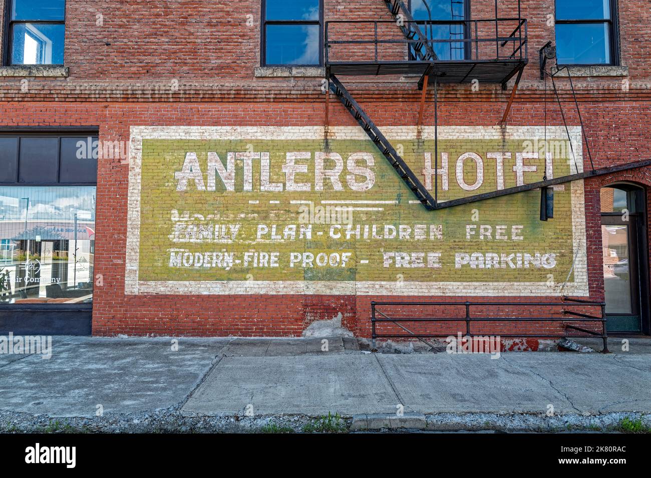 A ghost sign for the Antlers Hotel in the historic district of Baker City, Oregon, USA Stock Photo