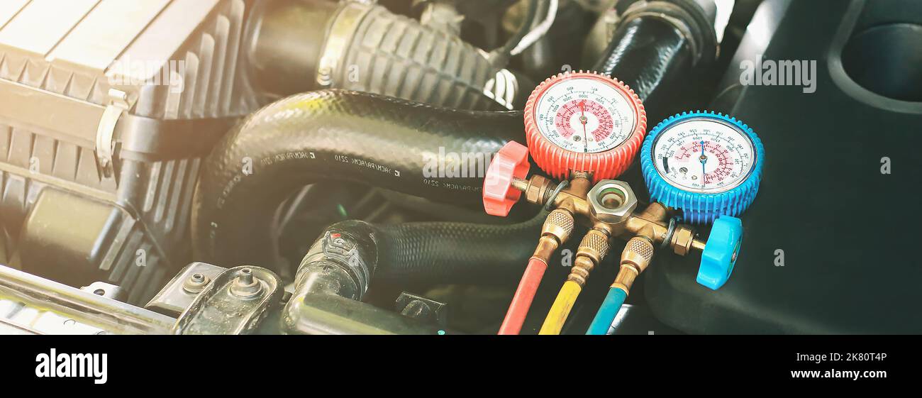 Car air conditioner check service leak test and fill refrigerant Stock