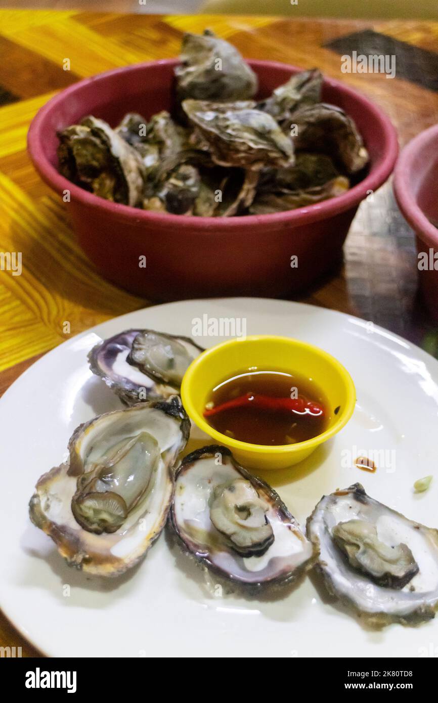 Fresh steamed oysters served at a local restaurant in Iloilo