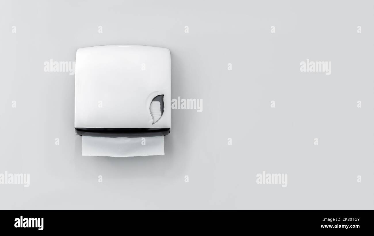 A box of toilet paper in the bathroom on a white background Stock Photo