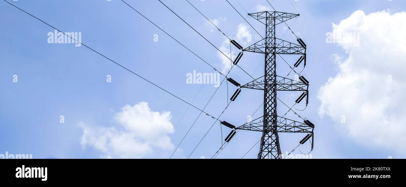 High voltage poles with sky and clouds in the background Stock Photo ...