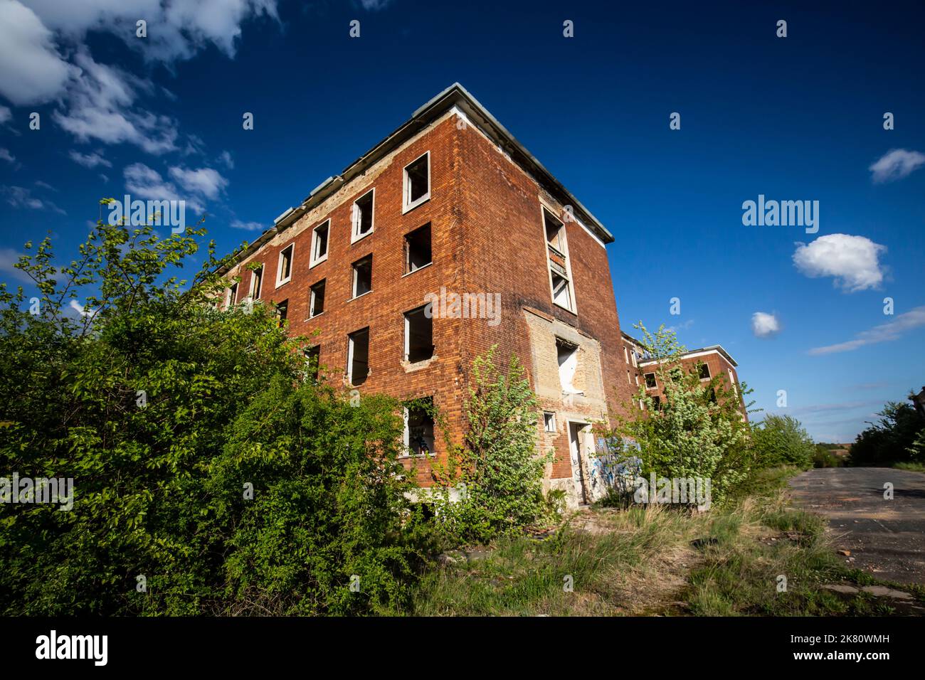Abandoned brick building at blue sky Stock Photo - Alamy