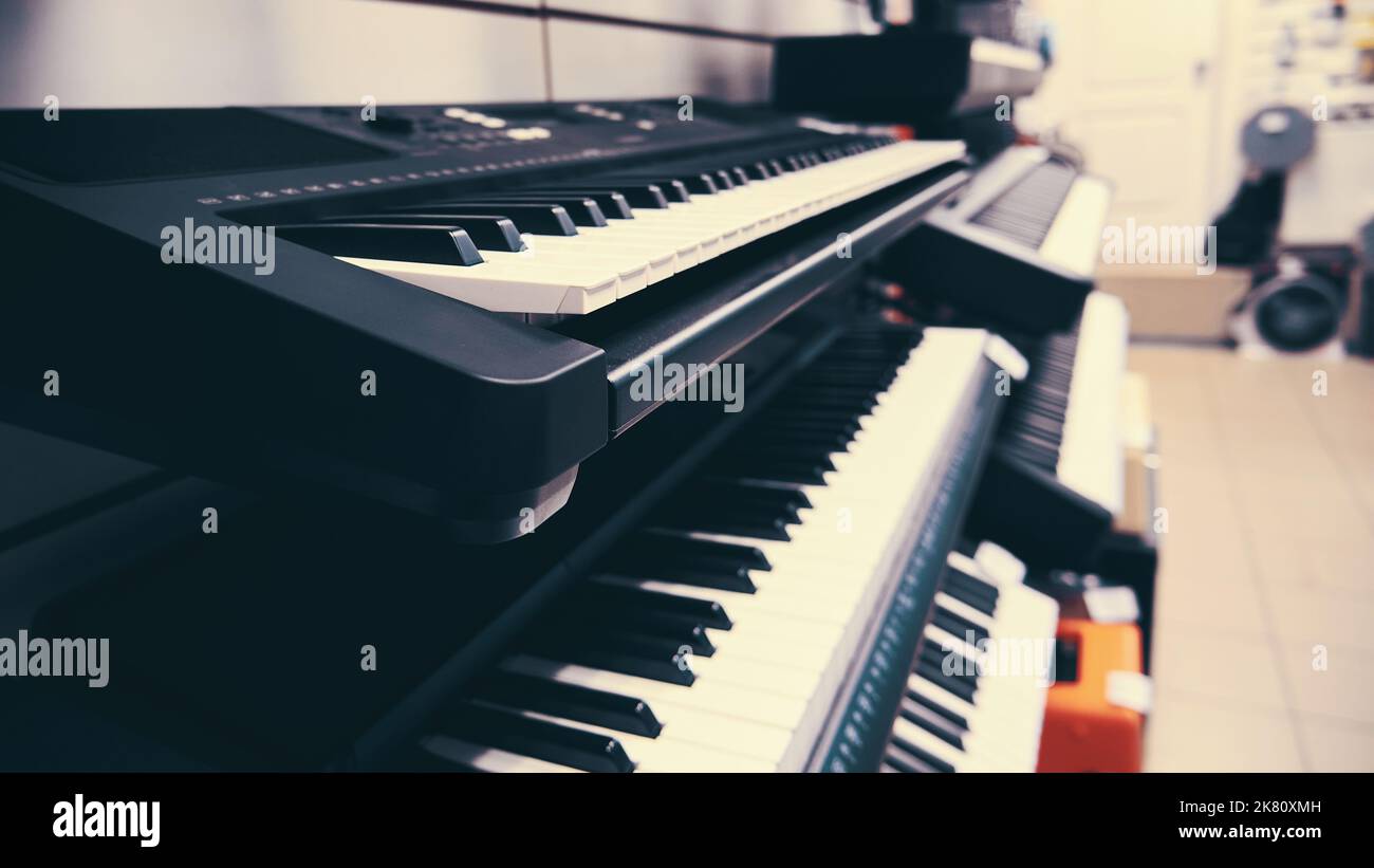 Modern synthesizer keyboards side view. Electronic musical instruments