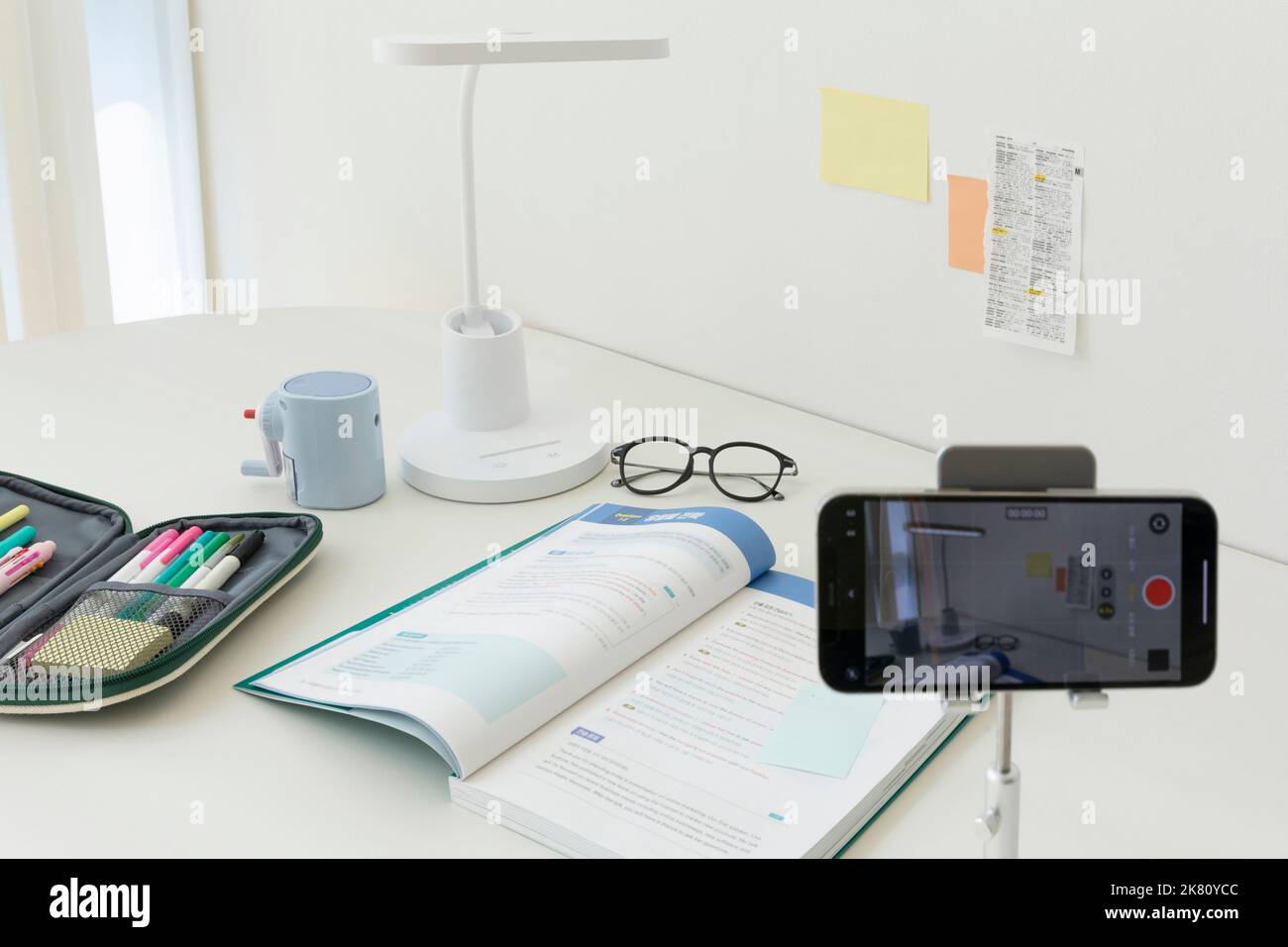 studying at home, study desk setup filming a study video Stock Photo