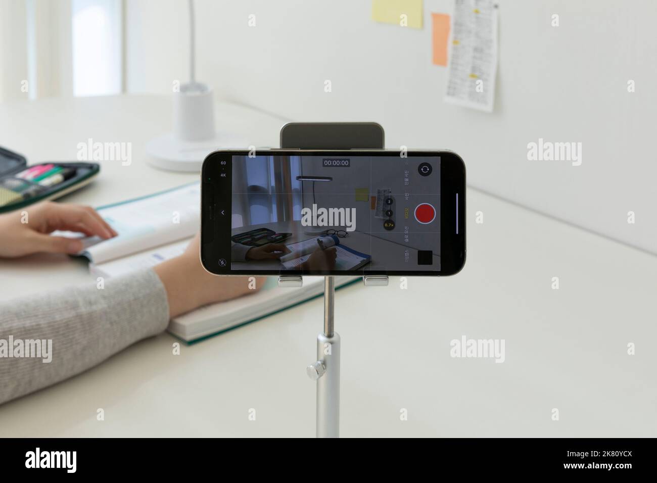 studying at home, study desk setup filming a study video Stock Photo
