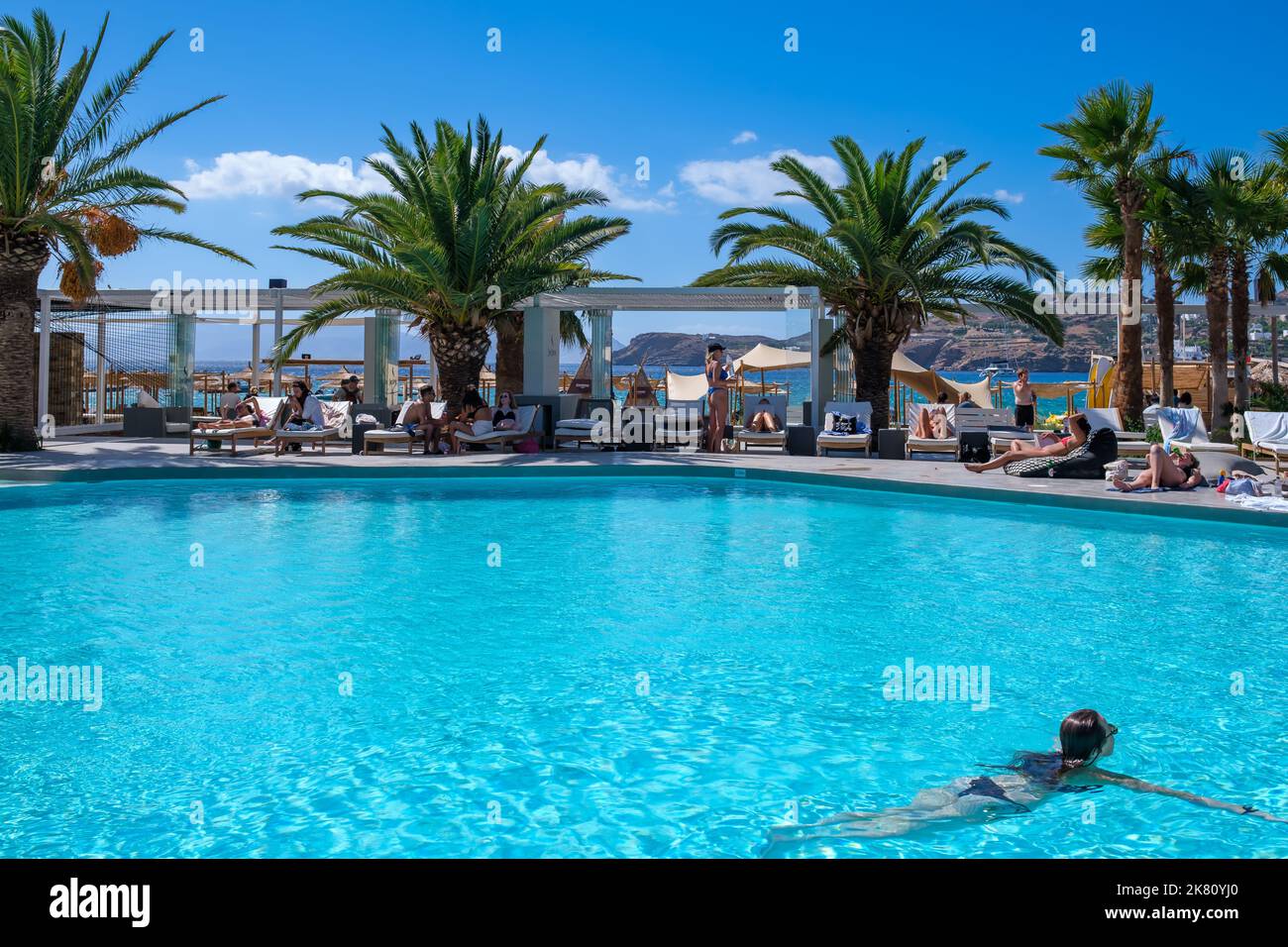 Ios, Greece September 6, 2022 Young tourists enjoying an outdoor