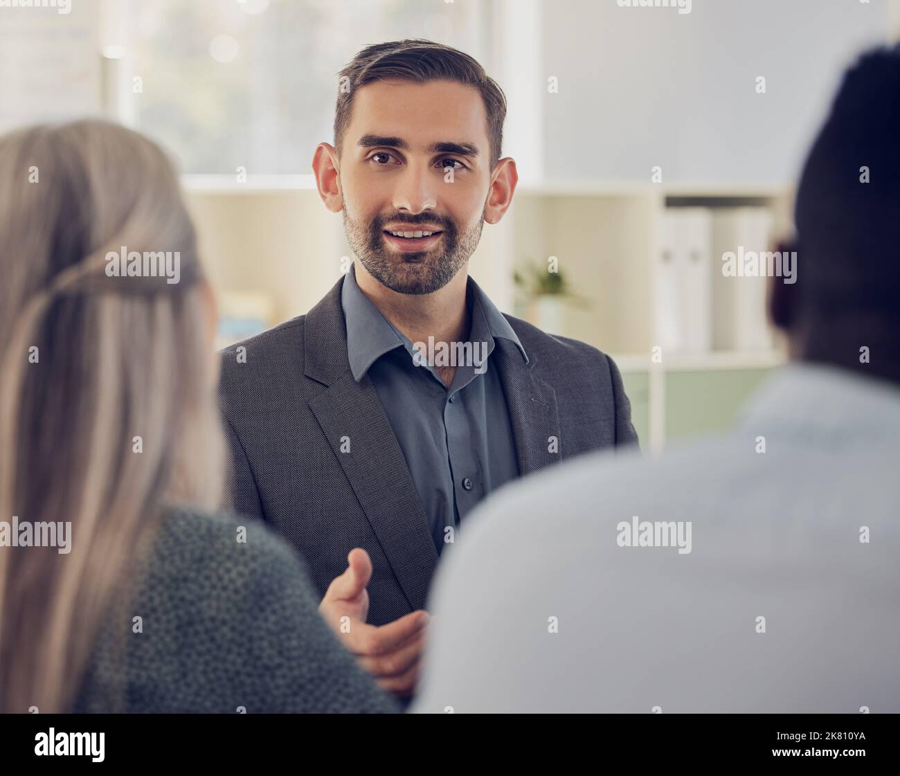 Businessman, mentor and speaker in teamwork meeting, global