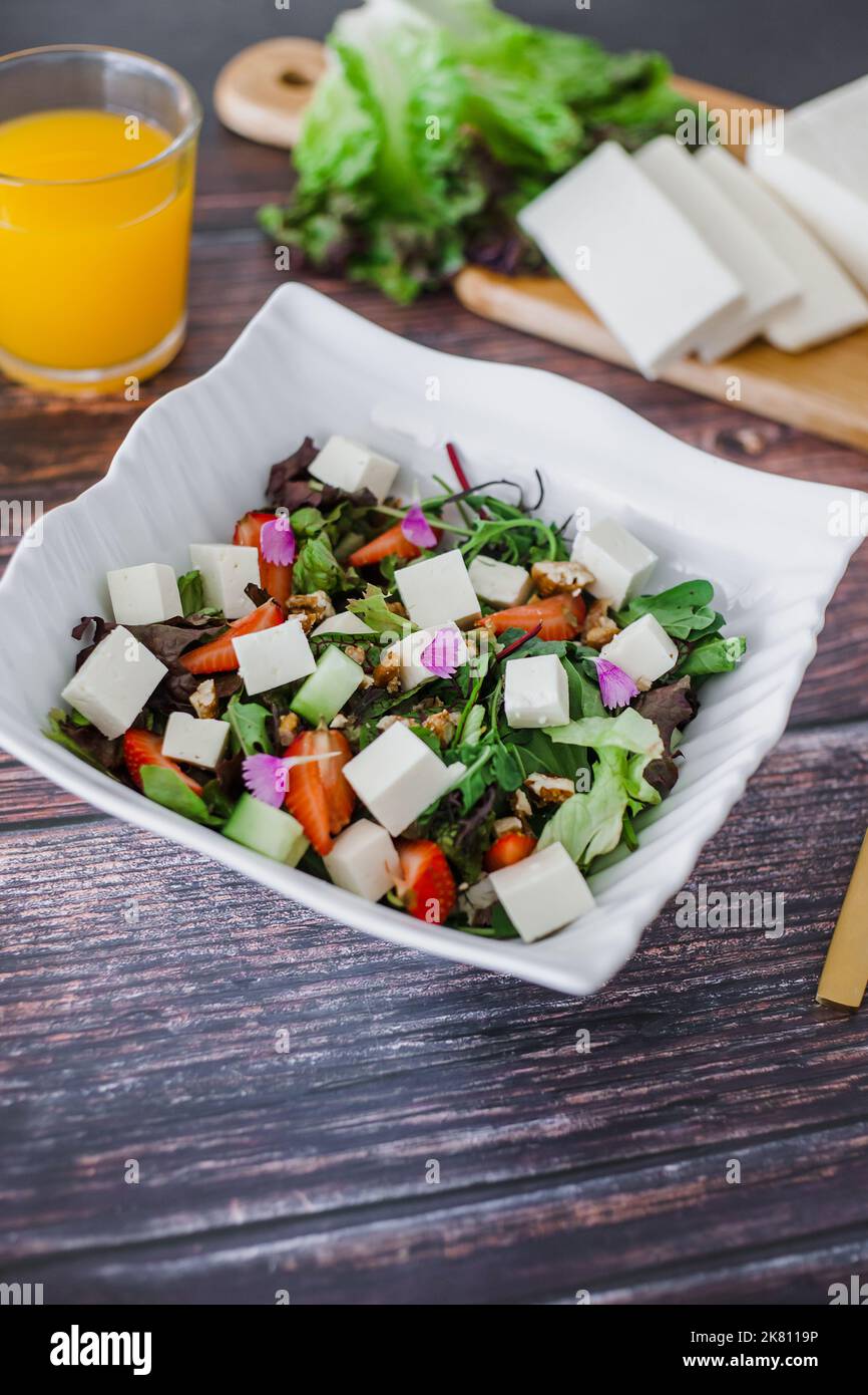 mexican salad bowl with panela white cheese and ingredients in Mexico Stock Photo