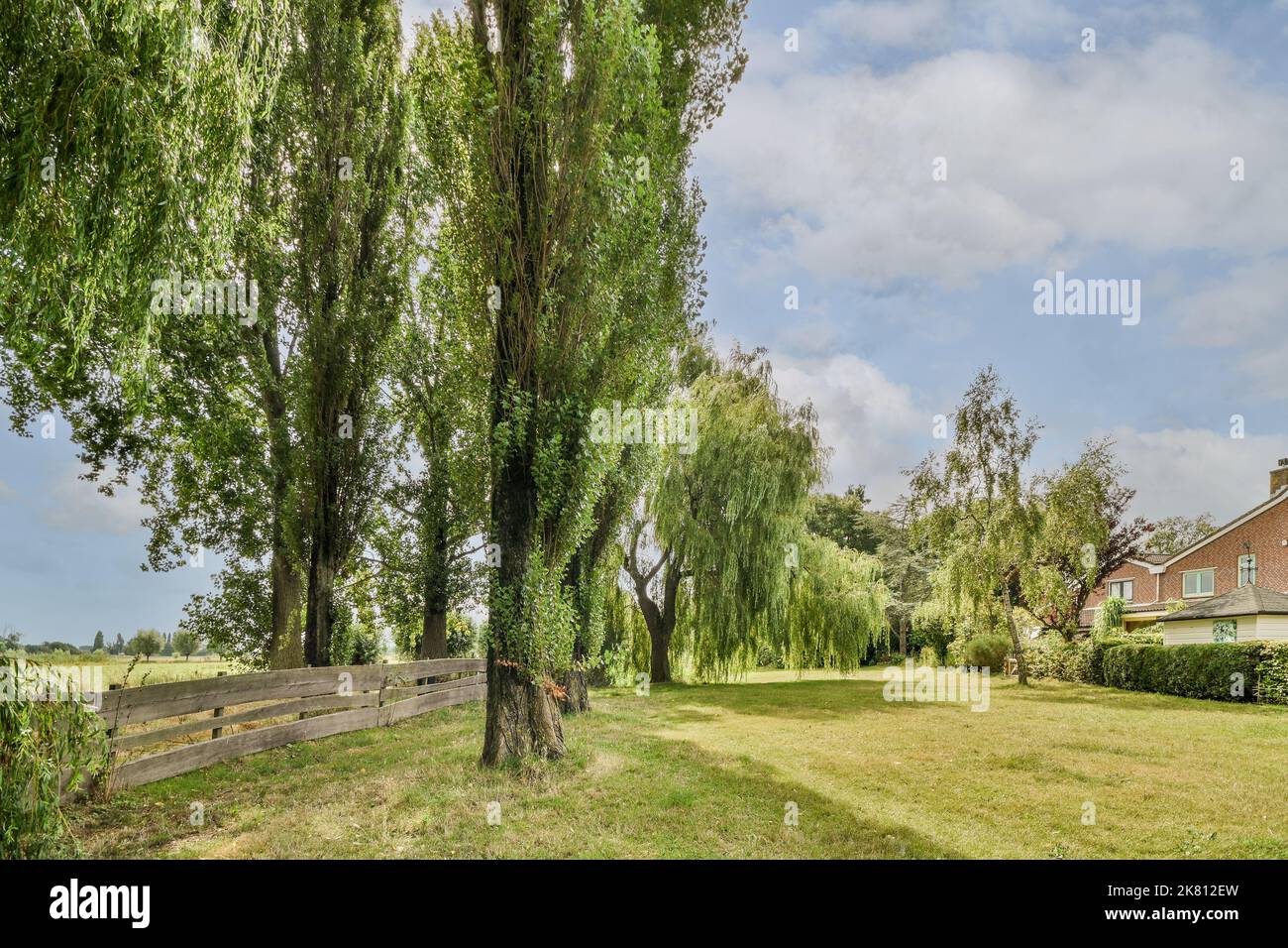 Simple patio with garden near children's playground Stock Photo Alamy