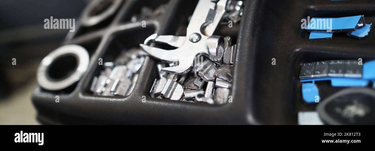 Workers tool kit full of instruments, metal nozzles, parts and