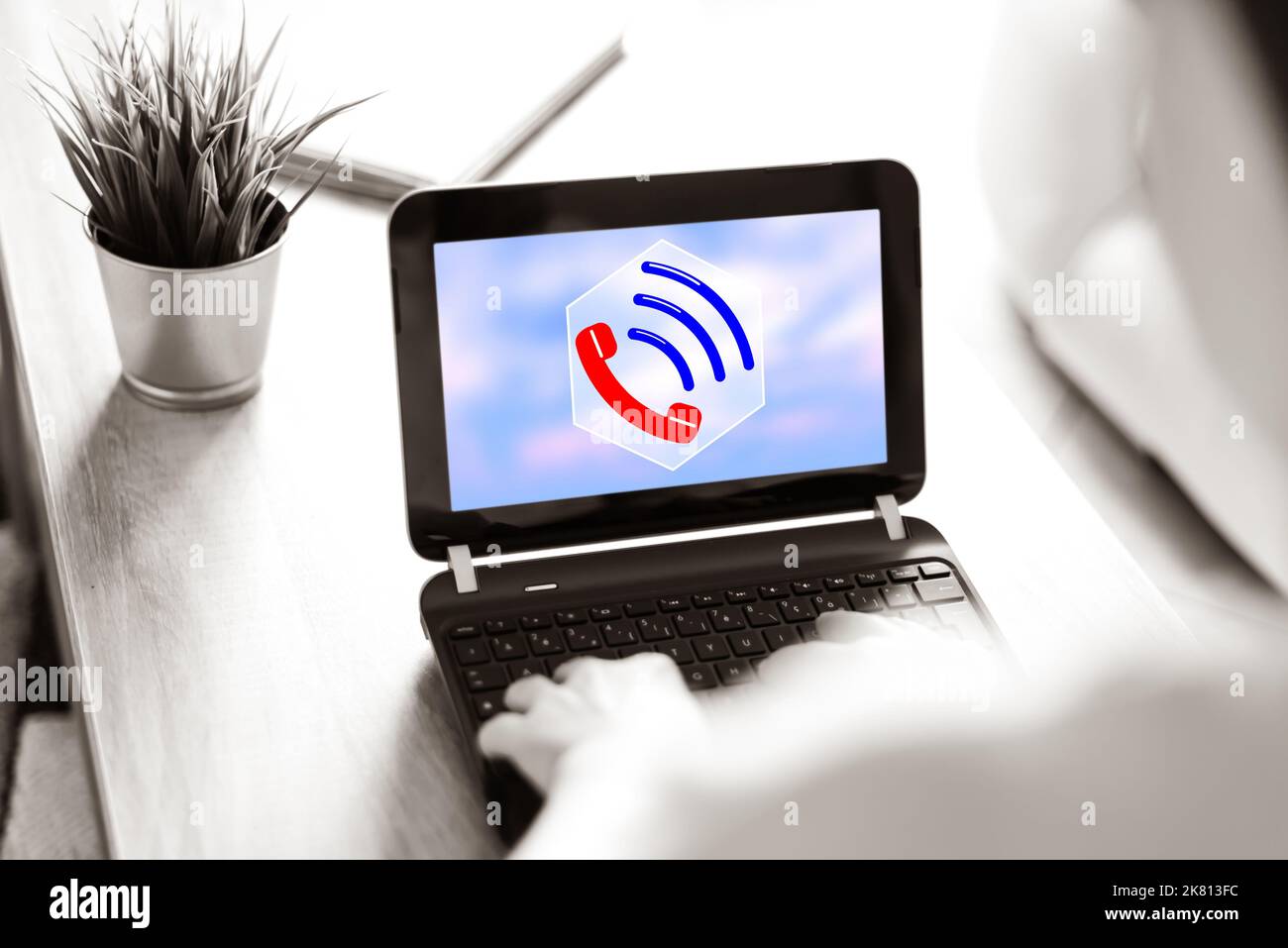 Laptop screen displaying a hotline concept Stock Photo - Alamy