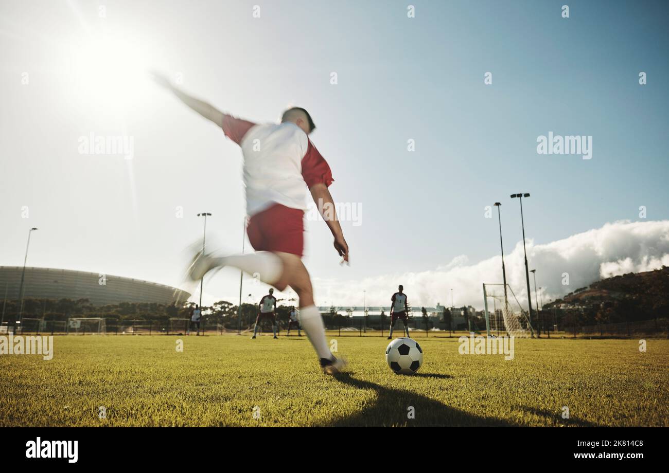 Football Or Soccer Shot With A Neutral Design Ball Being Kicked, With  Motion Blur On The Foot And Natural Background Stock Photo, Picture and  Royalty Free Image. Image 27280599.