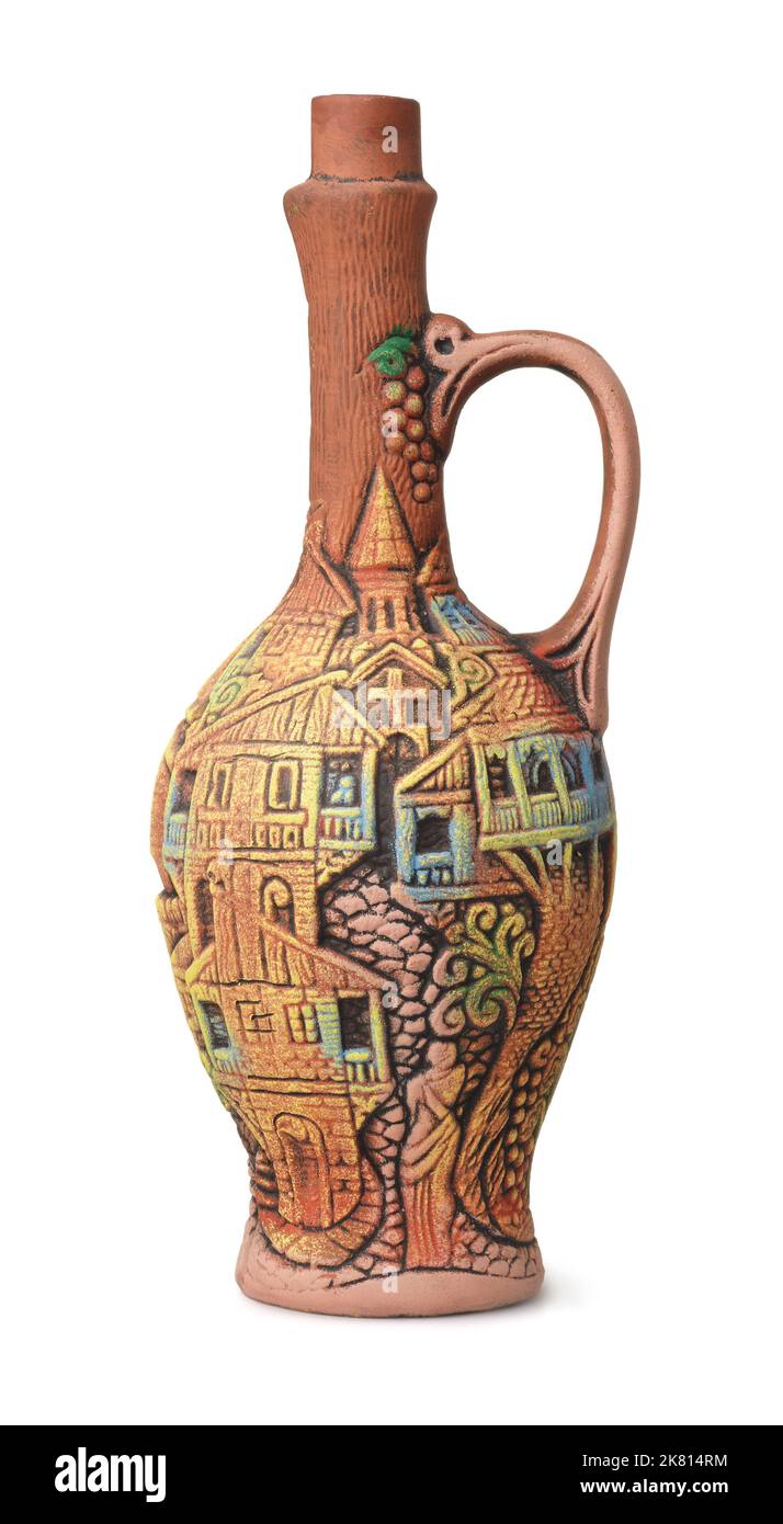 Side view of decorated clay wine jug isolated on white Stock Photo