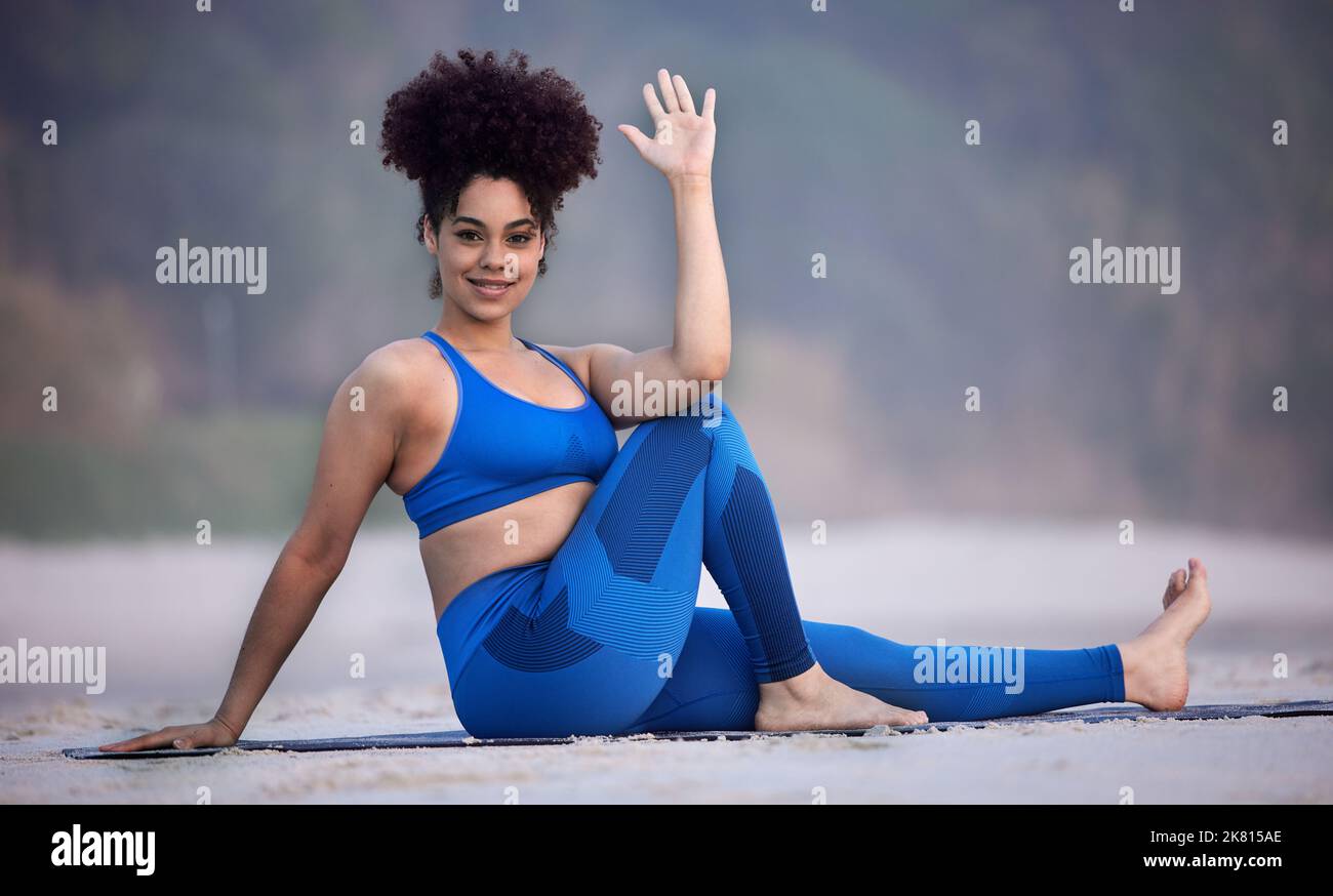 Yoga is the dance of every cell. a young female doing yoga on the beach Stock Photo Alamy