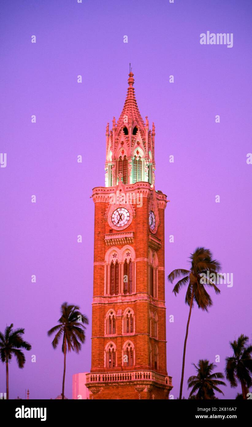 India: The Rajabai Clock Tower, University of Mumbai, Fort campus, Mumbai, built in so-called‚ Bombay Gothic style. The University of Bombay, as it was originally known, was established in 1857. The Rajabai Tower and library building were designed by Sir George Gilbert Scott and completed in 1878. Stock Photo