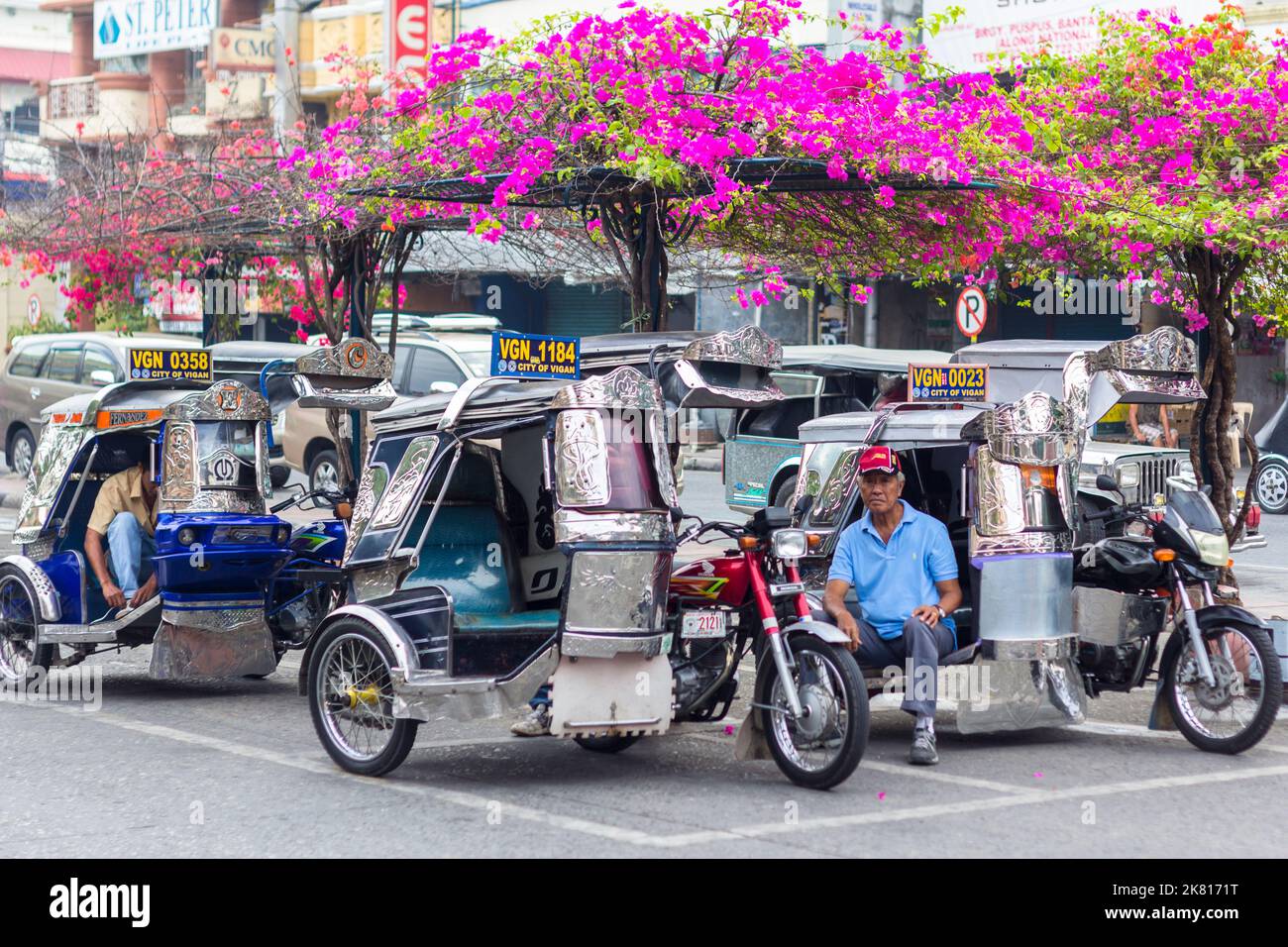 Tricycles at a terminal in Vigan City, Philippines Stock Photo