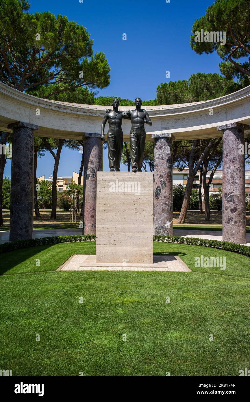 The World War II Sicily-Rome American Cemetery and Memorial site in Italy covers 77 acres, rising in a gentle slope from a broad pool with an island a Stock Photo