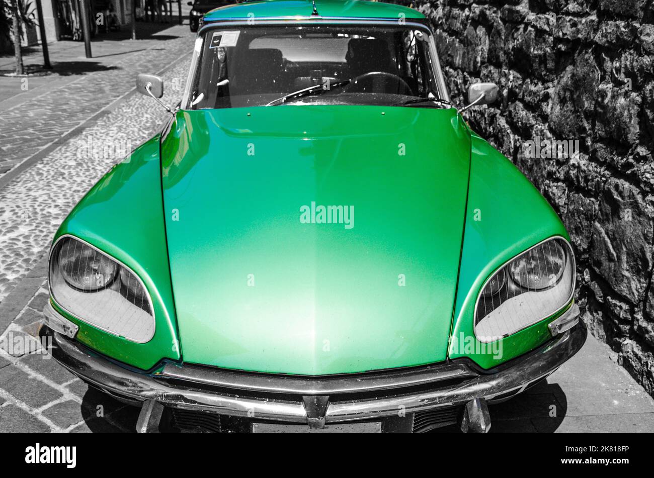 Green Citroen DS in Italy with monochrome background Stock Photo